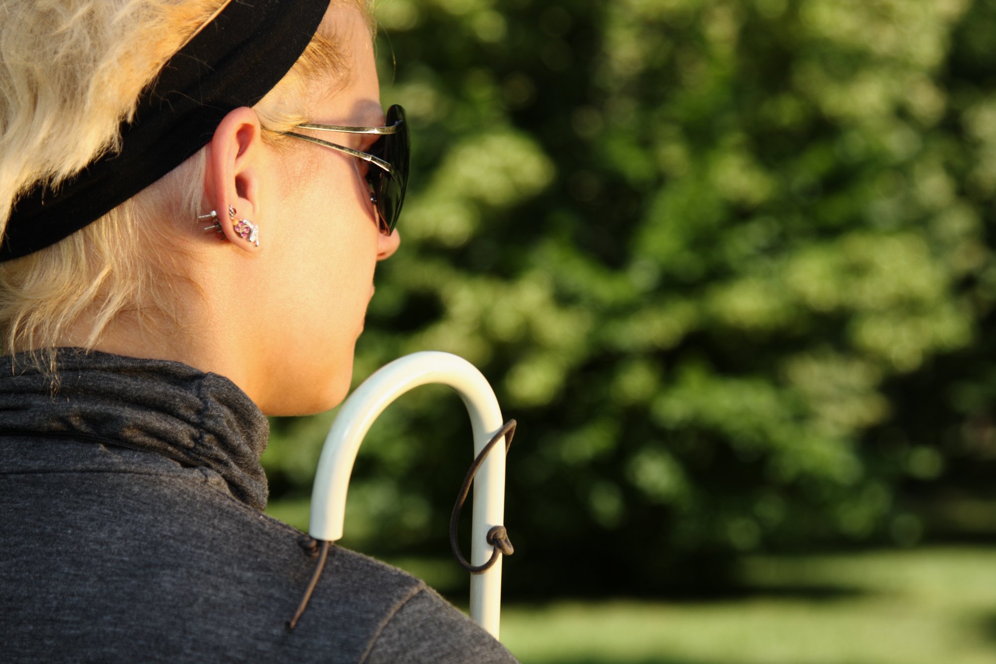 Why Blind People Wear Sunglasses: Protection, Communication, and Identity